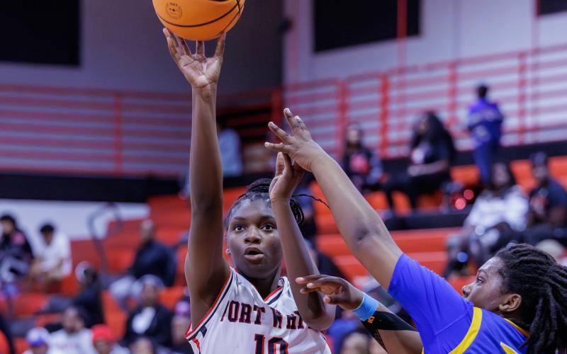 Fort White forward Jahlaya Wilson shoots against Newberry on Dec. 19. (JACK HOWDESHELL/Lake City Reporter)