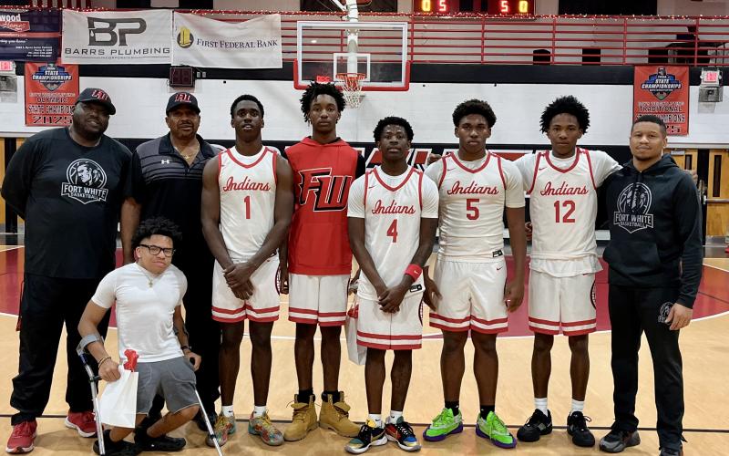 Fort White honored seniors Jayden Jackson (1), Desean Lally (red shirt), Jhailynd Cooper (4), Darion Brinson (5) and Jonathan Bessent (12) for Senior Night prior to Tuesday's win over Bronson. (COURTESY)