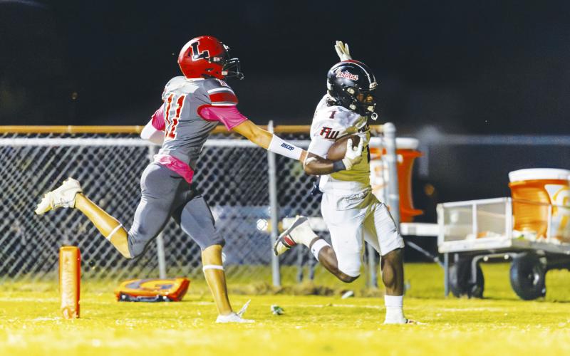 Fort White running back John'l Lawson scores a touchdown against Lafayette on Oct. 3, 2025. (JACK HOWDESHELL/Lake City Reporter)
