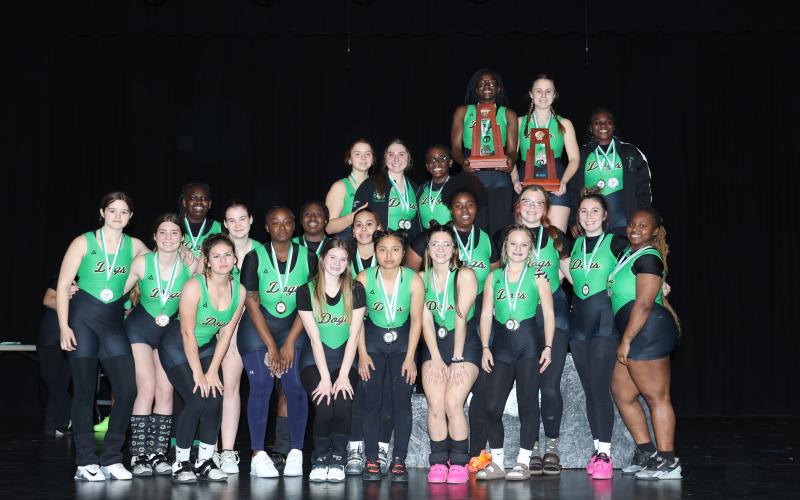 The Suwannee girls weightlifting team poses with the District 4-1A medals and trophies on Friday. (PAUL BUCHANAN/Lake City Reporter)