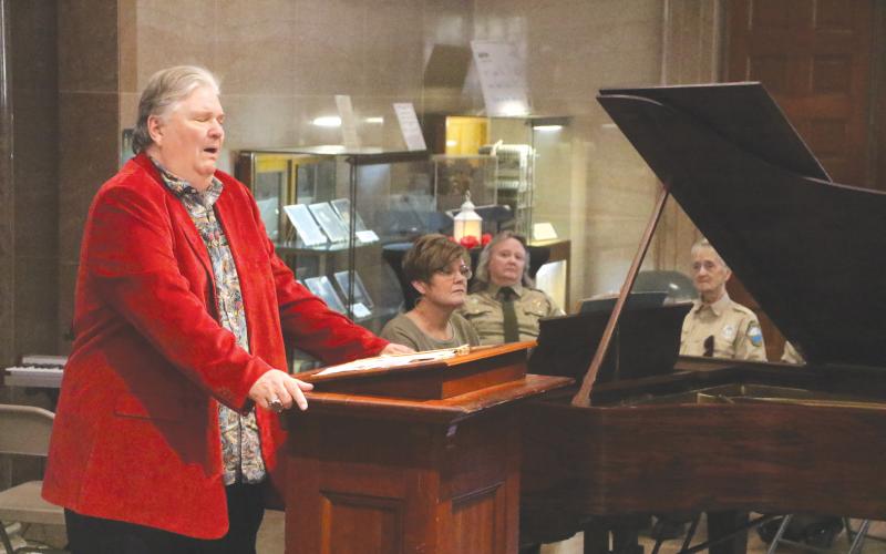 Johnny Bullard (left) performs Stephen Foster’s ‘Hard Times Come Again No More,’ accompanied by his sister-in-law, Amanda Bullard, on piano during Sunday’s Stephen Foster Day celebration at the Stephen Foster Folk Culture Center State Park. (MORGAN MCMULLEN/Lake City Reporter)