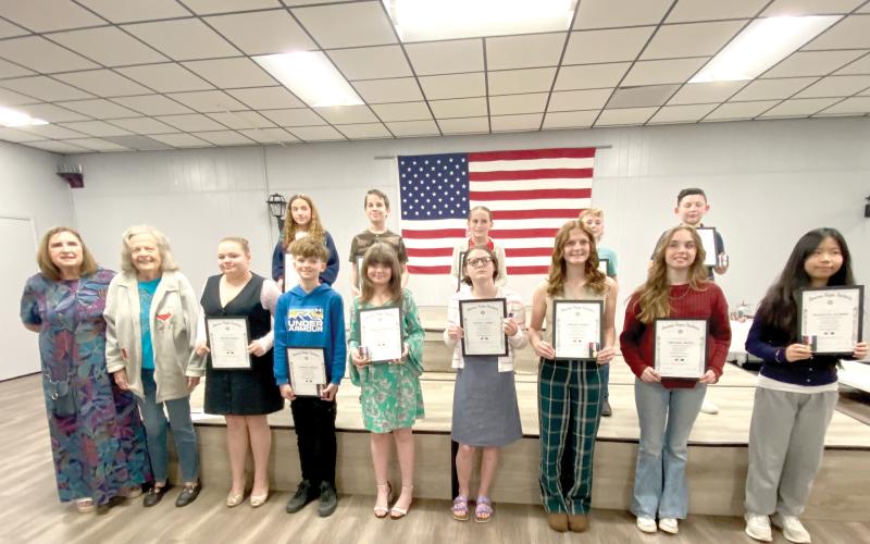 American Legion Auxiliary Unit 57 American Essay Contest winners included, in front, Irma Wehrli (from left), Judy Ripple, Kynlee Bogie, Timothy Steele, Kazzeley Vernon, Darien Cooper, Daelyn Cooper, Witness Hatch, Katheryn Coleman; back row, Olivia Medeiros, William Matheney, Madison Cruess, Kaiden Berg and Mason Garling. (COURTESY)