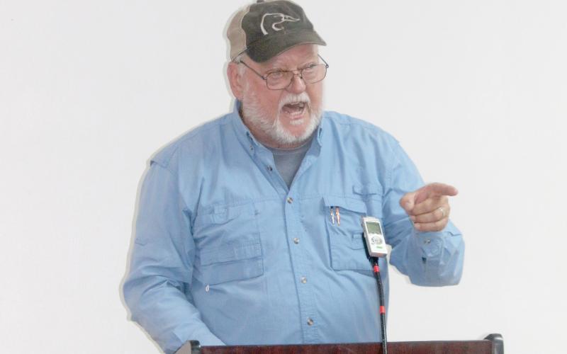 Fort White resident Carl King angrily responds to the Fort White Town Council during its special meeting Tuesday night about town dissolution. (TONY BRITT/Lake City Reporter)