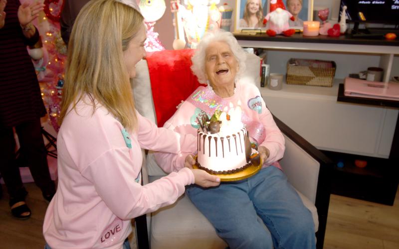 Helena Powers smiles as she sees her 110th birthday cake earlier this month. (JOHN CLARE STOKES/Special to the Reporter)