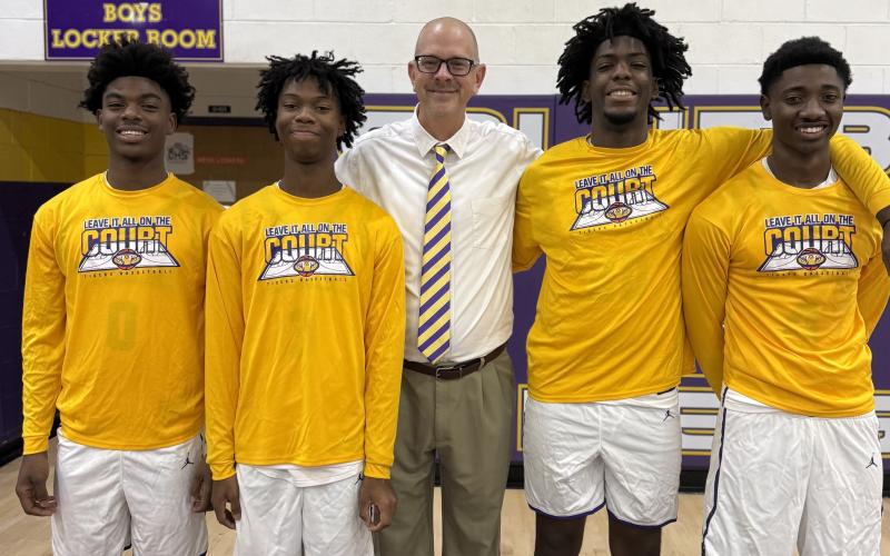 Columbia honored four seniors on Senior Night before Saturday’s win over Santa Fe. Pictured are Murkail Cray (from left), Gavin Broomfield, coach Steve Faulkner, Terrance Tolbert and Lamari Bell. (COURTESY)