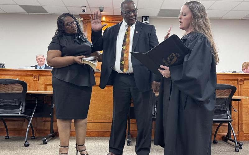 Clyde Fleming was sworn in as the new District 2 commissioner in Suwannee County by County Judge Jennifer Griffin on Tuesday. Fleming was accompanied by his wife, Patricia. (JAMIE WACHTER/Lake City Reporter)