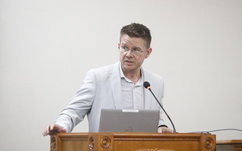 Suwannee River Water Management District Communications and Outreach Office Chief Troy Roberts talked with the Suwannee County Commission and concerned residents Tuesday night about the Water First North Florida aquifer recharge project. (JAMIE WACHTER/Lake City Reporter)