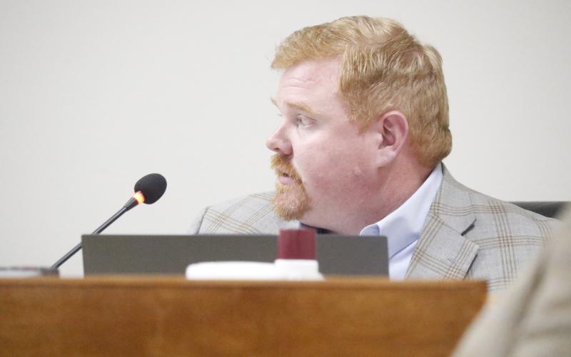 Suwannee County Attorney Adam Morrison warned the commissioners about a string of land deals the past few months that have left 14 property owners with non-conforming land that can’t be built on. (JAMIE WACHTER/Lake City Reporter)