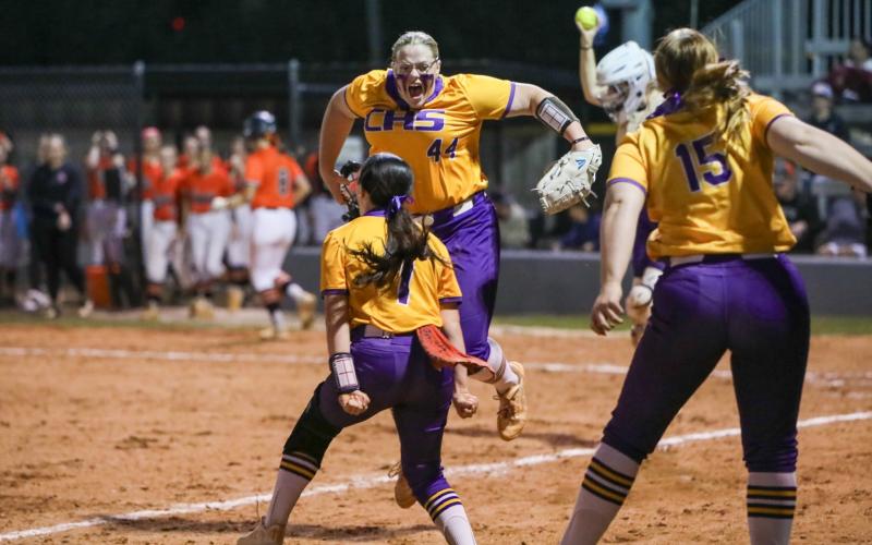 Columbia pitcher Josie Raulerson (44) celebrates with teammates after finishing off a 3-2 win over Trenton with a strikeout on Thursday. (BRENT KUYKENDALL/Lake City Reporter)