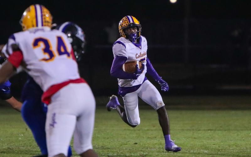 Columbia cornerback Tacori Allen returns a punt for a touchdown against Ridgeview last season. (FILE)