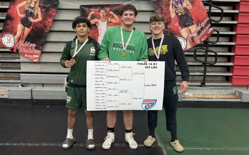 Suwannee wrestlers Rylan Milian (from left), Holden Corbin and Landon Slater qualified for state after reaching the medal stand at the Region 1-1A meet on Saturday. (COURTESY)