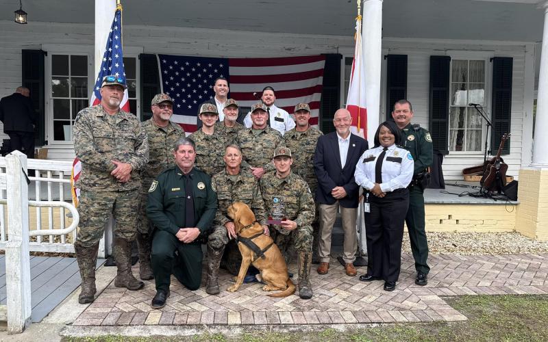 Members of the Mayo Correctional Institution K9 team, which won the Region 2 team competition, include Sgt. Matt Tompkins, Sgt. Mike Schreck, Sgt. Taylor Fain, Sgt. Kevin Koch, Andy Lamb, Bill Barger, Clay Wimberley and Harvey Lashley. (COURTESY)