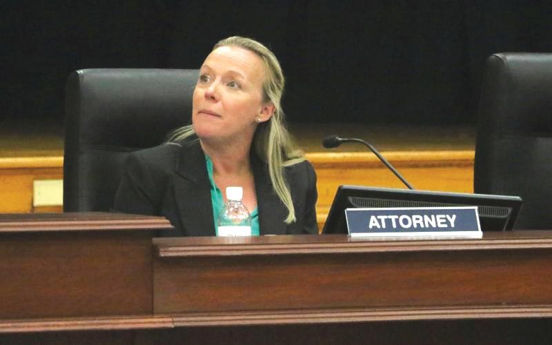Columbia County School Board Attorney Meagan Logan listens during a previous school board meeting. Logan will remain the board’s attorney through March 31, 2029, after the board approved a new deal. (FILE)