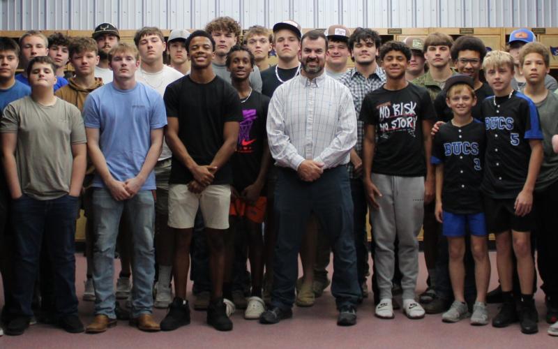 New Branford coach Will Dettor (white shirt) is pictured with his new team. (COURTESY)