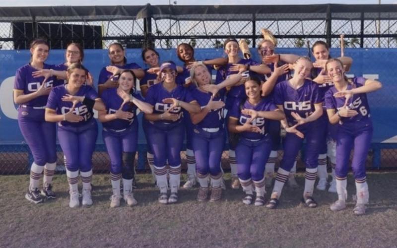 Columbia’s softball team celebrates with a pose after defeating IMG Academy 9-4 on Wednesday. (COURTESY)