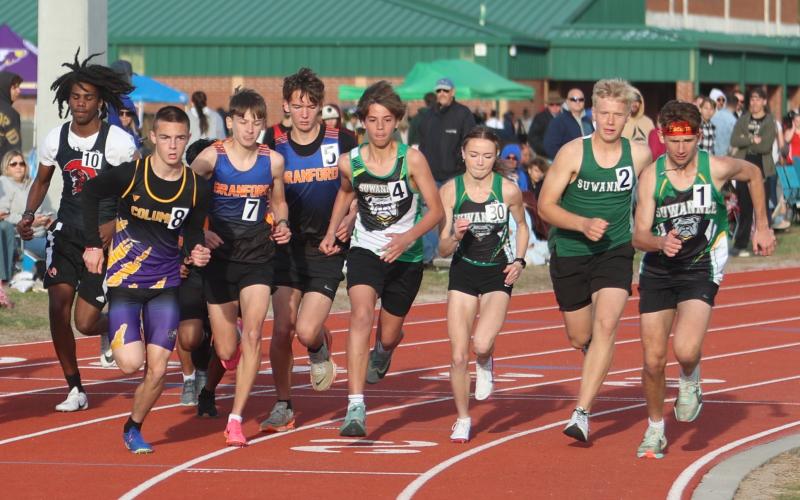 Runners from Columbia, Branford and Suwannee compete in the 1600m at the Suwannee Mini Meet on Tuesday. (PAUL BUCHANAN/Lake City Reporter)