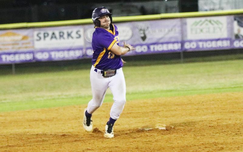 Columbia pitcher Kyler Keen turns off second base before being held up during a win over St. Augustine on March 11. (JORDAN KROEGER/Lake City Reporter)