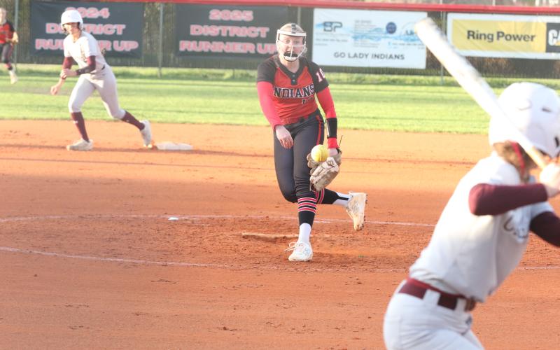 Fort White pitcher Graceanne Durrance tosses a pitch during Tuesday's 18-0 loss to Madison County. (MORGAN MCMULLEN/Lake City Reporter)