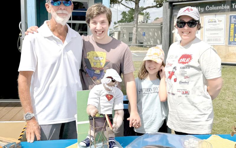 Mark Mansbach (left and below) was a board member of the Lake City Columbia County Tennis Association for five years and served as its tennis pro and a dedicated coach. (COURTESY)