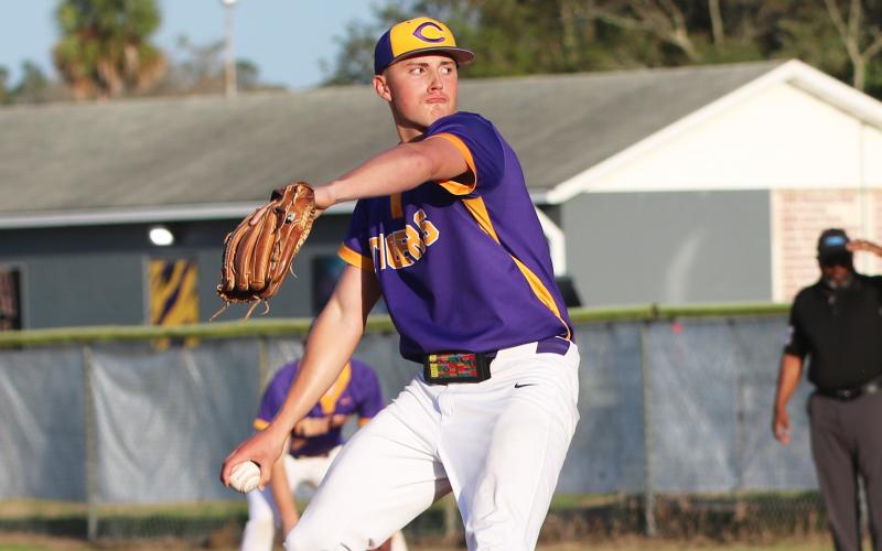 Columbia pitcher Tison McCray winds up to pitch against Forest on March 4. (JORDAN KROEGER/Lake City Reporter)