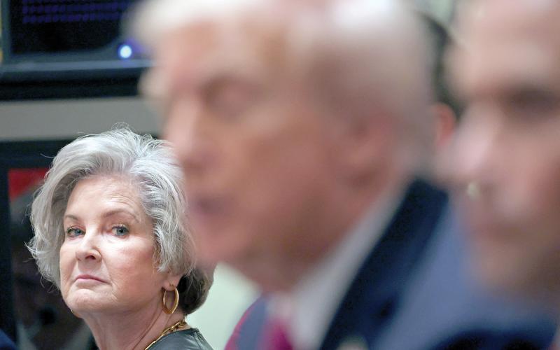 White House chief of staff Susie Wiles, a Lake City native (left), looks on at President Donald Trump in the Cabinet Room of the White House in Washington, D.C., on Oct. 17, 2025, has been diagnosed with ‘early stage’ breast cancer. (Tom Brenner/AFP/Getty Images/TNS)