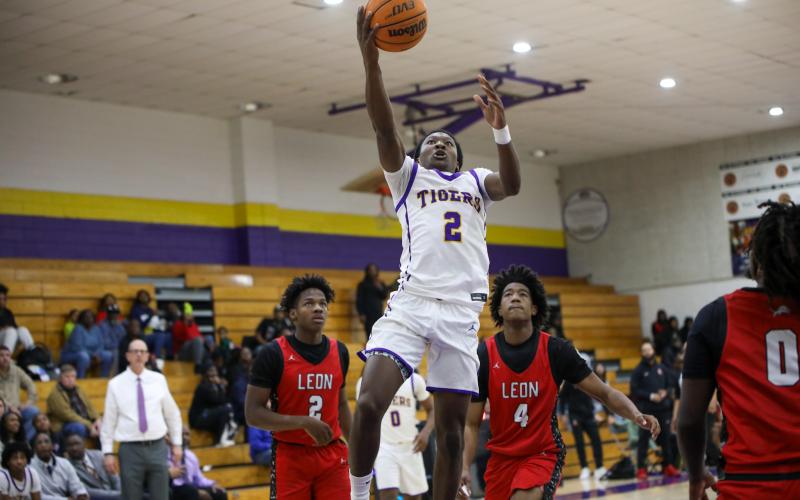 Columbia guard Kadrian Wilson rises for a bucket against Leon during the district semifinals this past season. The two teams won't be in the same district the next two seasons. (BRENT KUYKENDALL/Lake City Reporter)