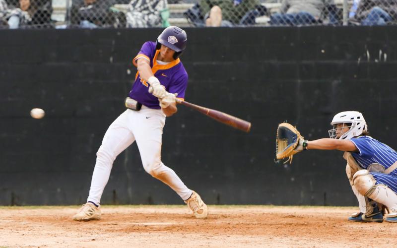 Columbia second baseman Madden Mann drives in a run against Keystone Heights on Monday. (BRENT KUYKENDALL/Lake City Reporter)