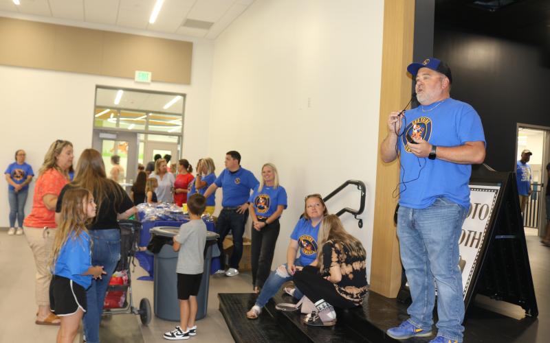 Roger Little (far right), Eastside principal, addresses the audience during the school’s open house event on Thursday. (TONY BRITT/Lake City Reporter)