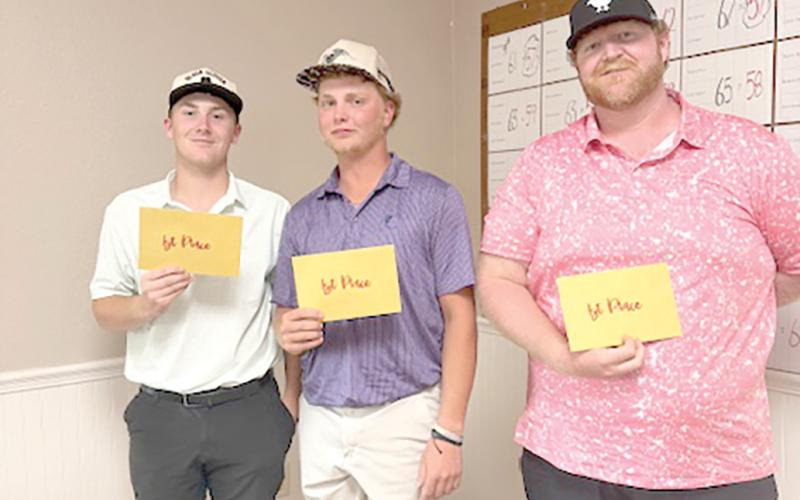 The winning team at the Branford Rotary Club’s annual golf tournament was Gavin Barnes (from left), Dylan Cannon and Jeffrey Barnes. (COURTESY)
