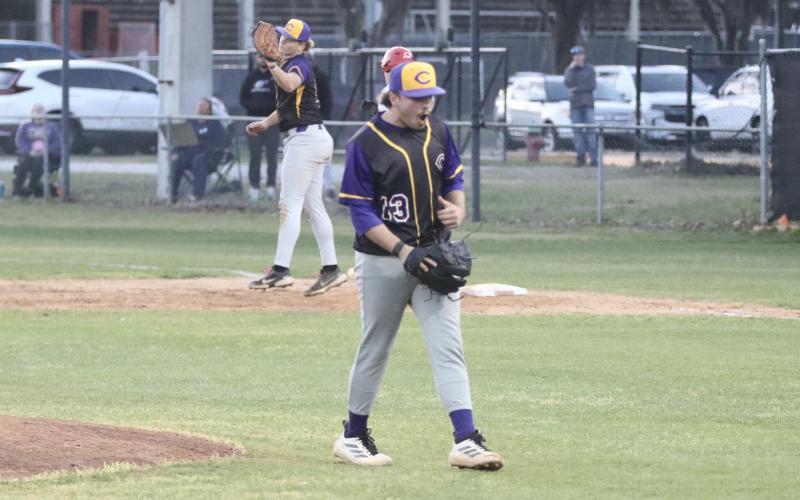 Columbia pitcher Kyler Keen celebrates as first baseman Nolan Slaymaker makes the catch at first base for the final out of the Tigers' 3-2 win over Santa Fe on Thursday. (JORDAN KROEGER/Lake City Reporter)