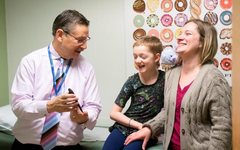 Marley Gaskins and her mother, Tamara Hogue, are pictured with UCLA Dr. Donald Kohn during a visit to California to take part in a clinical trial to combat severe leukocyte adhesion deficiency-I in 2019. Gaskins was the first patient to enroll in the study. (COURTESY)