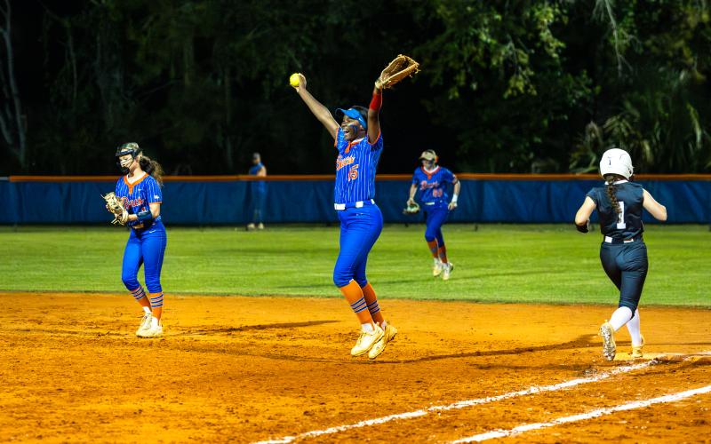 Branford first baseman Mallory Blue celebrates after making the final out that secured a 9-3 win over Union County in the Region 3-R semifinals on Thursday. (JACK HOWDESHELL/Lake City Reporter)