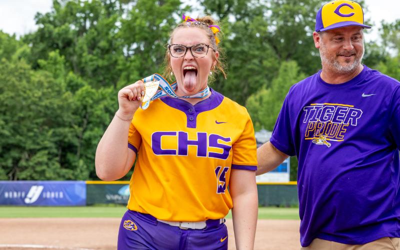 Columbia senior Raelyn Wehinger shows off her state championship medal after the Tigers defeated Lake Wales 3-2 in the Class 4A state championship on Saturday. (JACK HOWDESHELL/Lake City Reporter)