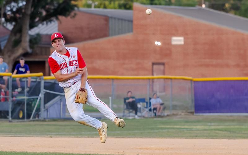 Lafayette shortstop Trevor Byrd makes a throw to first base against Union County during the District 6-R championship on April 16. (JACK HOWDESHELL/Lake City Reporter)