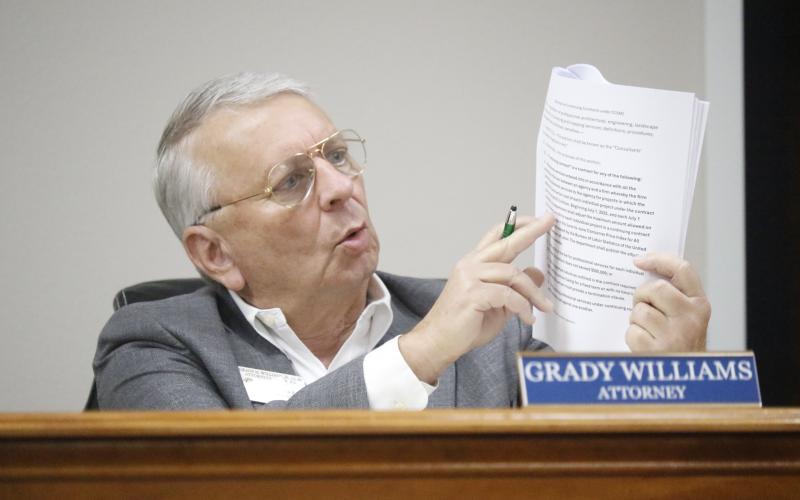 North Florida Water Utilities Authority Attorney Grady Williams talks to the board about the policy on how staff will select engineers on continuing services contracts for future projects. (JAMIE WACHTER/Lake City Reporter)