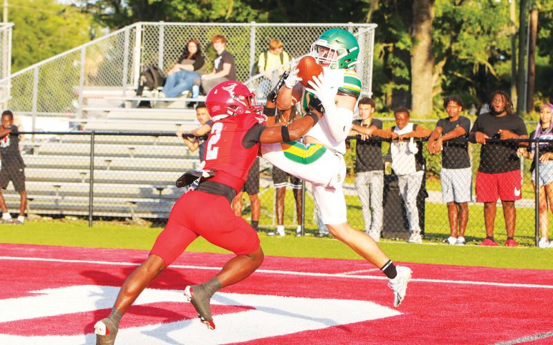 Lake City Reporter freelance photographer Brent Kuykendall’s photo of Suwannee receiver Koy Frier’s attempted grab against Bradford last spring won first place. (BRENT KUYKENDALL/Lake City Reporter)