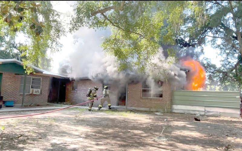 Lake City firefighters battle a blaze in a duplex on SE Brown Street on Wednesday. Nobody was injured in the fire although a dog perished. (COURTESY LAKE CITY FIRE DEPARTMENT)