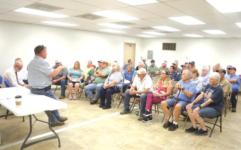 Columbia County Commissioner Tim Murphy (left) leads a discussion on Tuesday regarding a potential new community center in Columbia City. The meeting lasted roughly an hour and set up the next steps in the process. (MORGAN MCMULLEN/Lake City Reporter)
