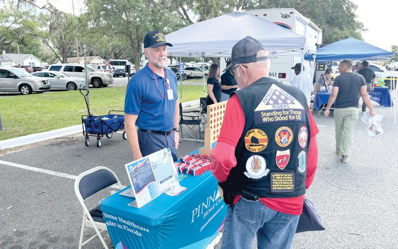 A veteran visits the Pinnacle Home Care table at last week’s Freedom 250 Veterans Fest at the Lake City VA Medical Center. (COURTESY)