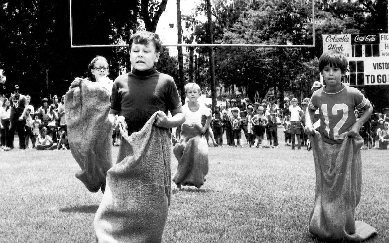 Children take part in a sack race at Memorial Stadium as part of Columbia County and Lake City’s Bicentennial celebration in 1976. (FILE)