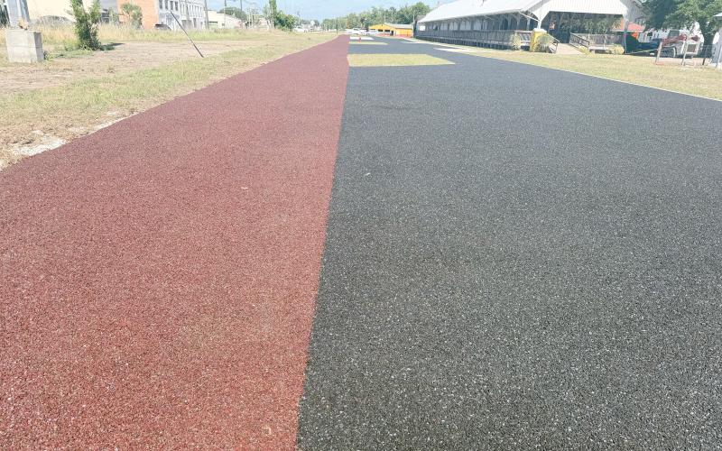 The parking improvements at Heritage Square on the north side of downtown Live Oak are now waiting on striping and lining to be completed. (FILE)