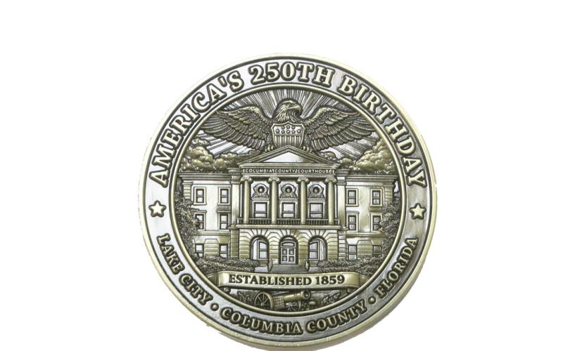 Columbia County's Kimi Roberts and her team commissioned 3,000 commemorative coins to mark the country's 250th anniversary. (MORGAN MCMULLEN/Lake City Reporter)