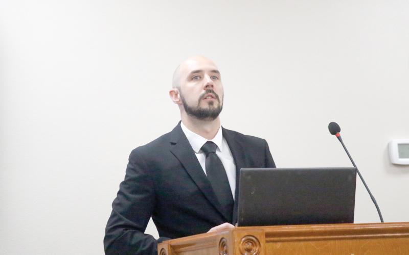 Caleb Perla, a partner with Powell and Jones, said Suwannee County is in ‘good shape’ financially with plenty of reserves. (JAMIE WACHTER/Lake City Reporter)
