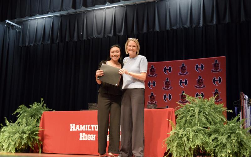 Hamilton County High’s Evelyn Cazarez receiveda North Florida College Presidential Scholarship, which covers full tuition and fees, from NFC President Jennifer Page. (COURTESY NORTH FLORIDA COLLEGE)