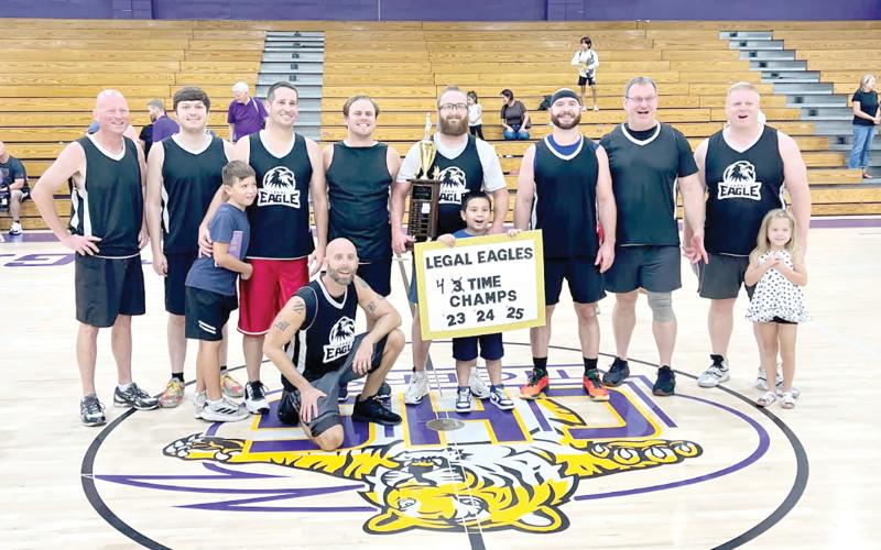 The Legal Eagles team of attorneys and judges from the Columbia County Courthouse won the Boots and Badges tournament Saturday, their fourth straight title in the event. (COURTESY)