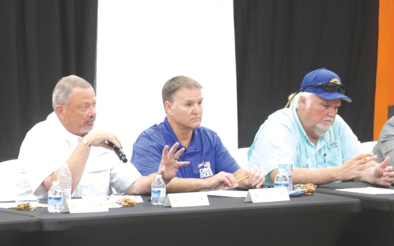 Columbia County Commission candidates Robert Lane (from left), Chris Dicks and Jody Dupree participate in Monday’s candidate forum at Richardson Community Center. (MORGAN MCMULLEN/Lake City Reporter)