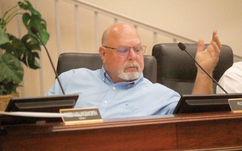 Columbia County Commissioner Rocky Ford said if the county wasn’t going to finish acquiring property to pave Mayo Road then it should give the property already acquired back to the residents. (JAMIE WACHTER/Lake City Reporter)