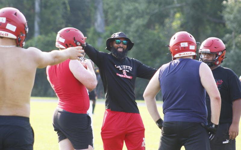 Lafayette coach Marcus Edwards directs his players during practice on July 28. (JAMIE WACHTER/Lake City Reporter)