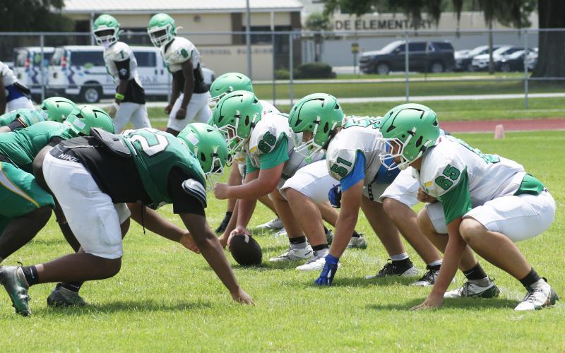 Suwannee’s offensive line gets set for a snap against the defense during Monday’s practice. (JAMIE WACHTER/Lake City Reporter)