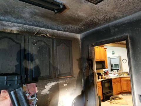 The garage of James and Athena Allen’s Bryceville home shows heavy fire damage. Family members were able to extinguish the flames before firefighters arrived Nov. 23. Photo courtesy of the Allen family.